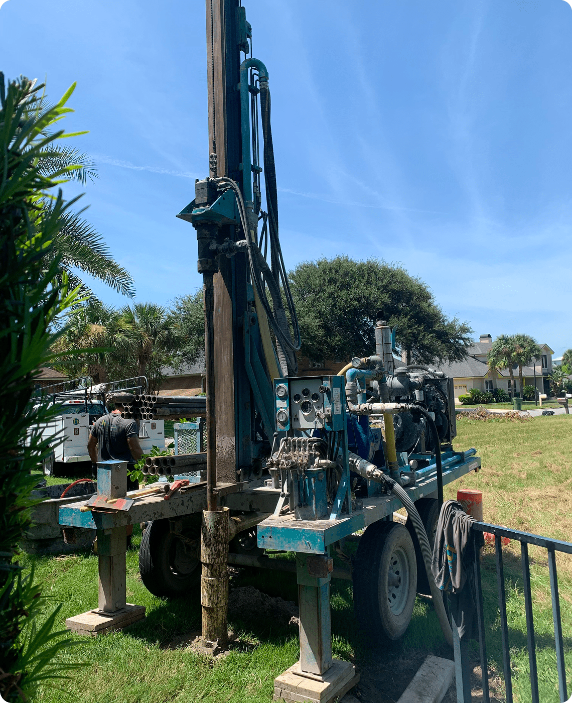 Drilling rig in a grassy field